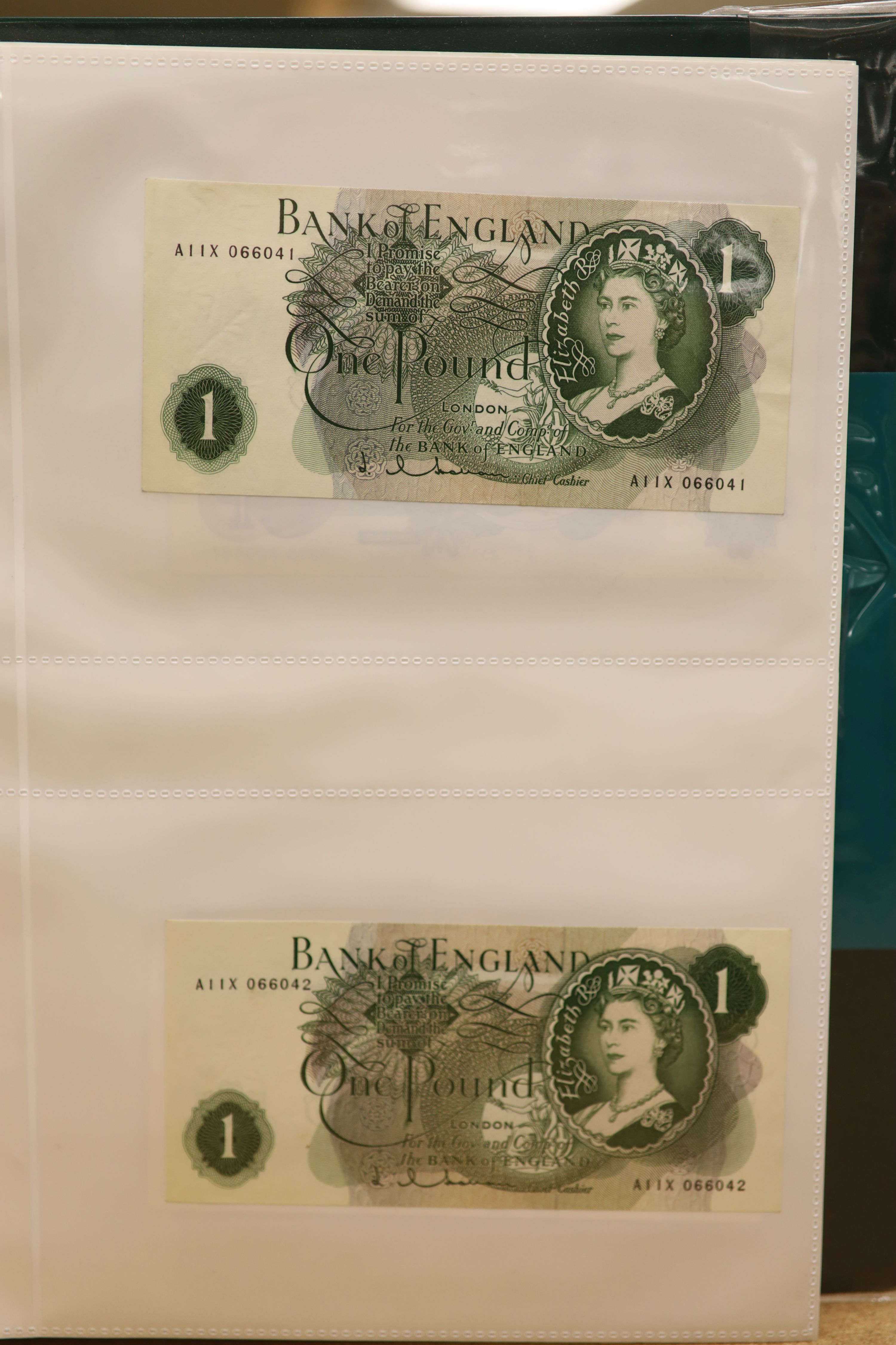 A collection of Bank of England and Scottish banknotes to include: 21 QEII 10 shillings, 14 O'Brien and Beale 10 shillings, 1 Peppiatt 10 shillings, 4 Hallam one pound notes, 18 O'Brien or Beale one pound notes, 8 Peppia